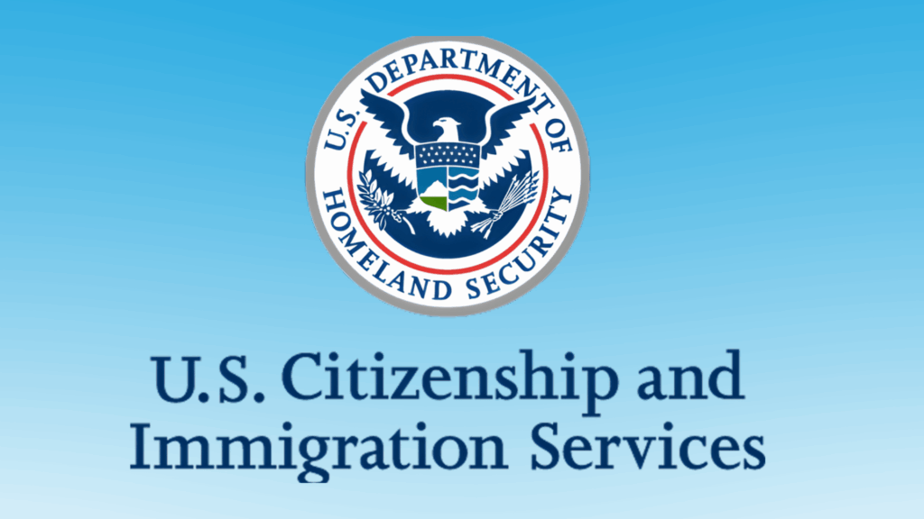 U.S. Department of Homeland Security seal above text reading “U.S. Citizenship and Immigration Services” on a blue background