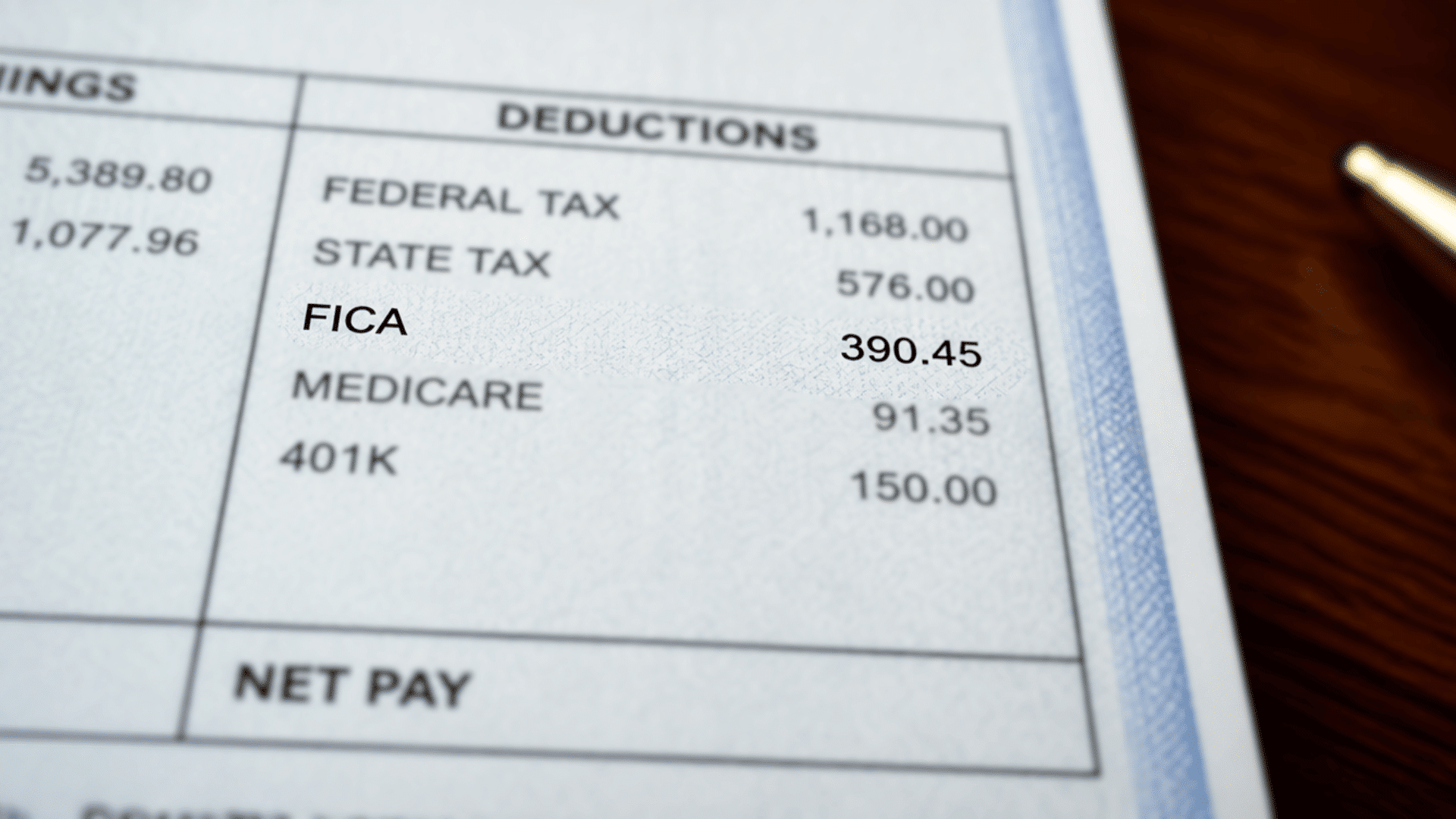 Pay stub showing fica, medicare, federal tax, and net pay deductions